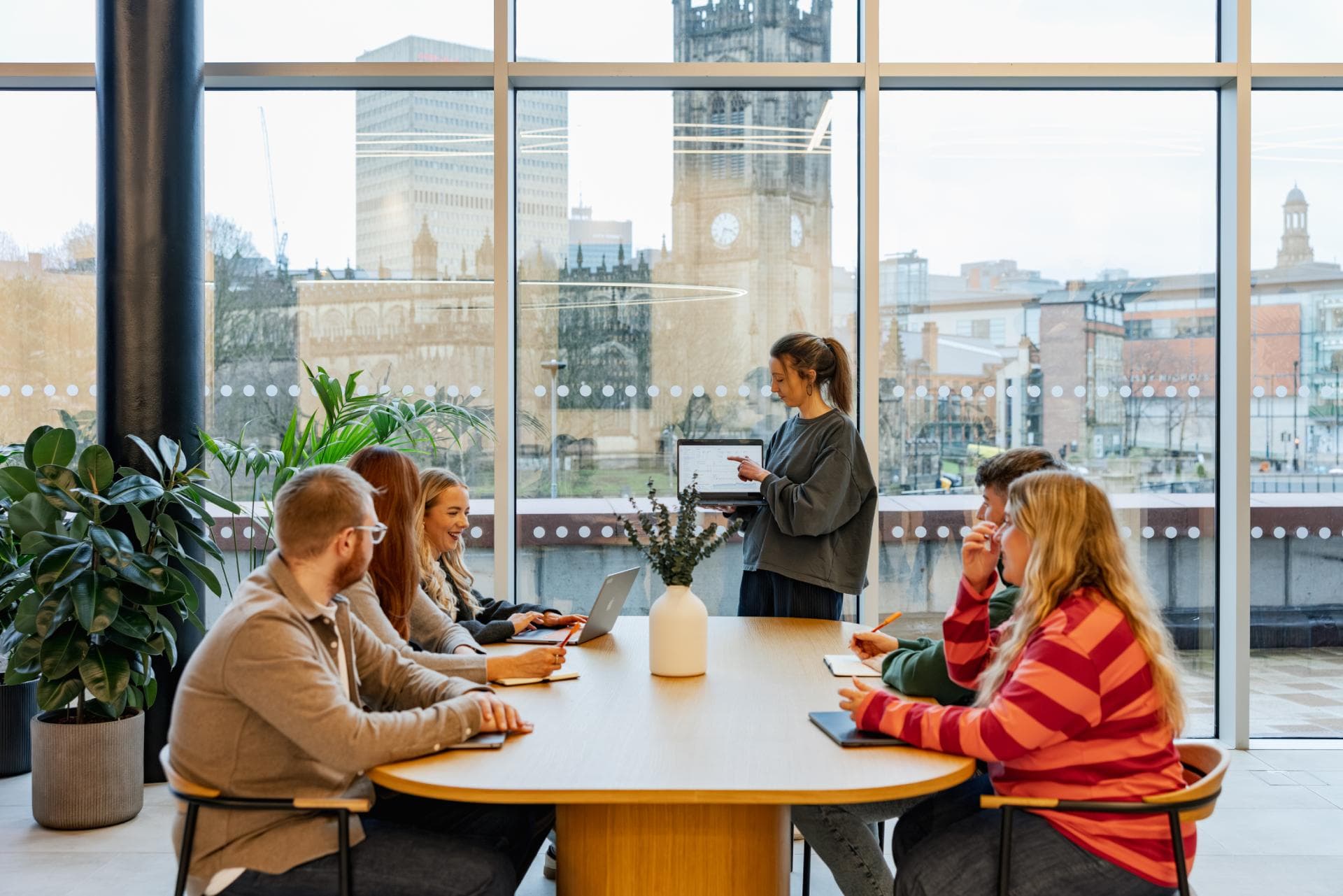Two people looking at a phone together